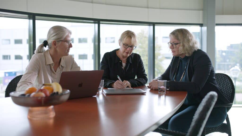 AmplioPharma the 3 founders in a meeting